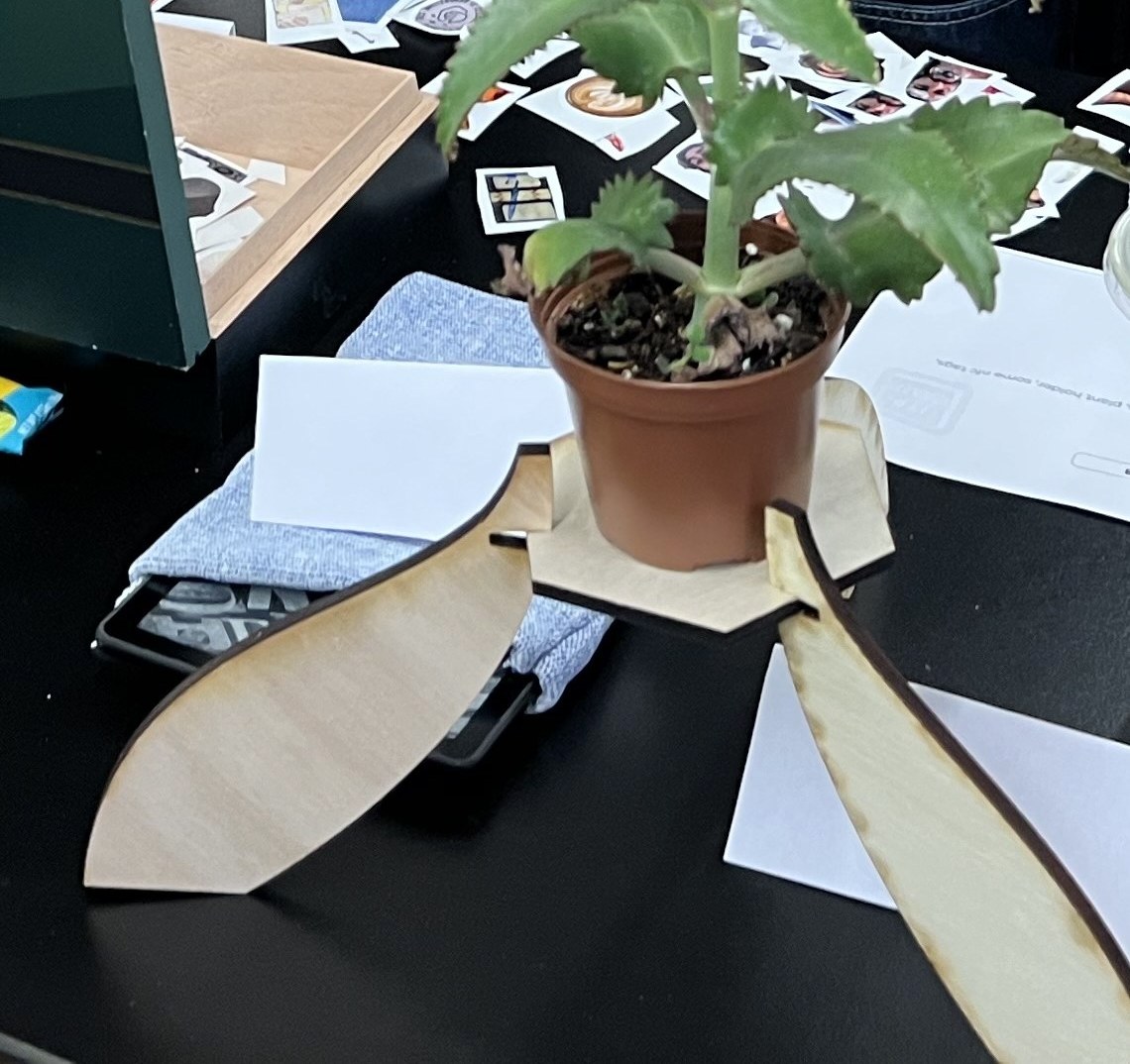 laser-cut plant stand